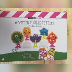 Monster cookie cutters with cookie holders and feet